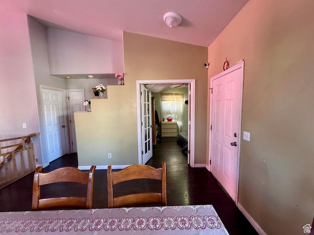 173 W Dimaggio Dr N, Tooele, UT 84074 - dining space featuring dark wood-style flooring, baseboards, and vaulted ceiling