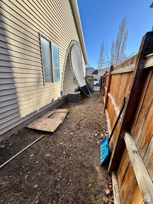 173 W Dimaggio Dr N, Tooele, UT 84074 - view of property exterior with central AC and fence