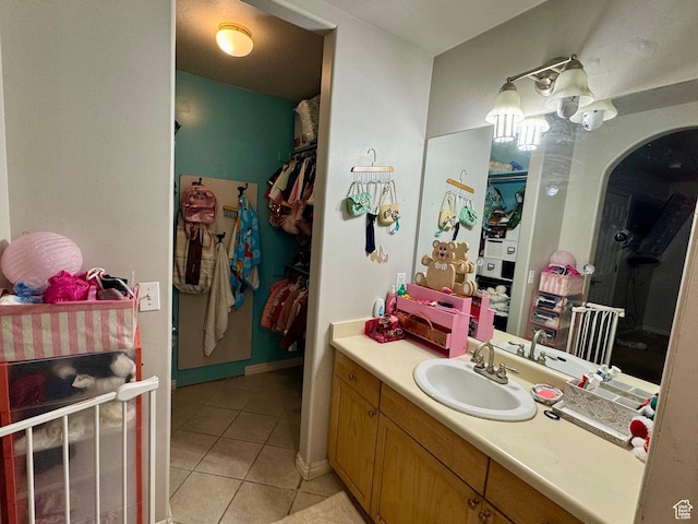 173 W Dimaggio Dr N, Tooele, UT 84074 - full bath featuring tile patterned flooring, vanity, and a walk in closet