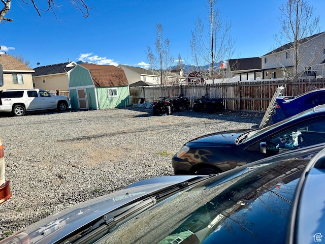 173 W Dimaggio Dr N, Tooele, UT 84074 - view of yard with an outbuilding, a storage unit, and a residential view