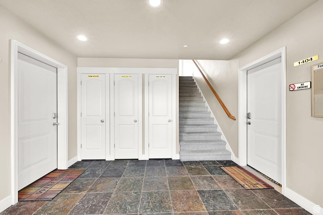 3518 N Moose Hollow Dr Unit 1402, Eden, UT 84310 - entryway with recessed lighting, stairs, baseboards, and stone tile flooring