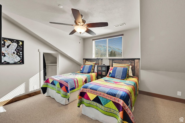 3518 N Moose Hollow Dr Unit 1402, Eden, UT 84310 - bedroom featuring baseboards, carpet flooring, a textured ceiling, a ceiling fan, and visible vents