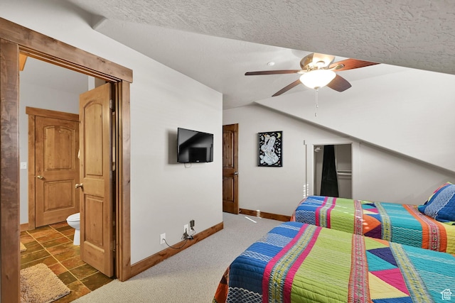 3518 N Moose Hollow Dr Unit 1402, Eden, UT 84310 - bedroom featuring ensuite bathroom, baseboards, ceiling fan, and a textured ceiling