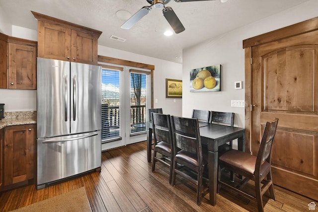3518 N Moose Hollow Dr Unit 1402, Eden, UT 84310 - dining room featuring visible vents, ceiling fan, and dark wood finished floors