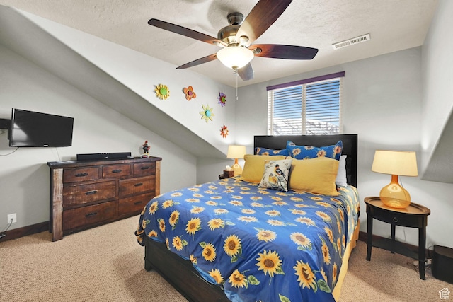 3518 N Moose Hollow Dr Unit 1402, Eden, UT 84310 - bedroom featuring vaulted ceiling, carpet flooring, a textured ceiling, visible vents, and ceiling fan