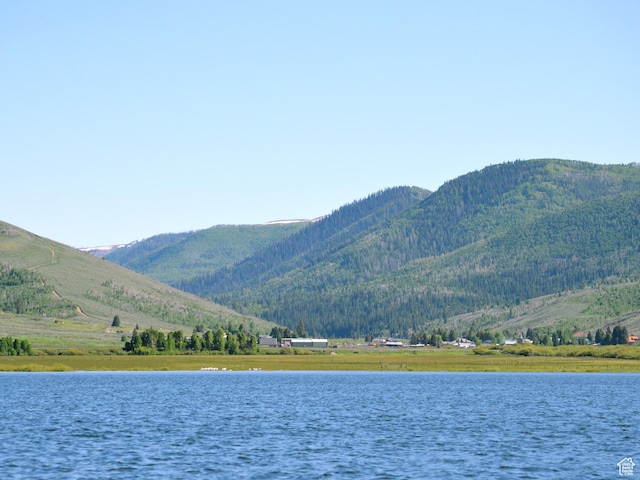 property view of water featuring a mountain view