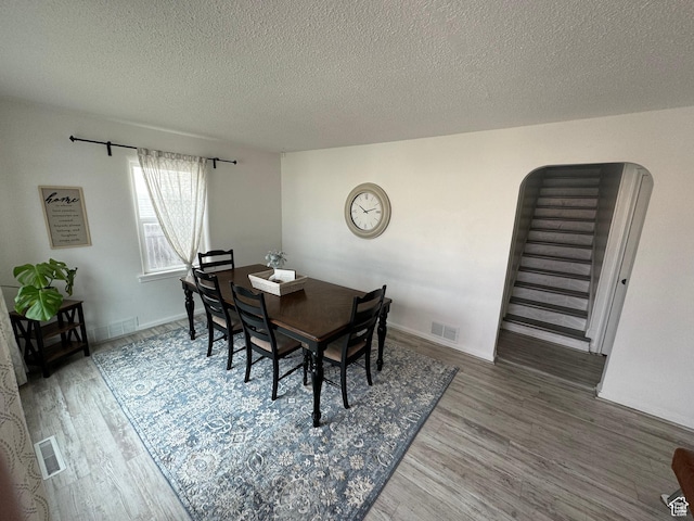 33 W 400 N, Orem, UT 84057 - dining room with visible vents, a textured ceiling, and wood finished floors