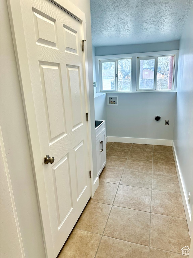 1022 W 400 N, Salt Lake City, UT 84116 - laundry room with a wealth of natural light, hookup for an electric dryer, baseboards, and hookup for a washing machine