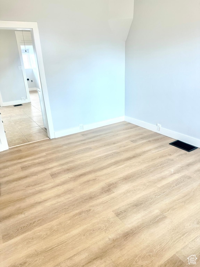 1022 W 400 N, Salt Lake City, UT 84116 - spare room with baseboards, visible vents, and light wood-style flooring
