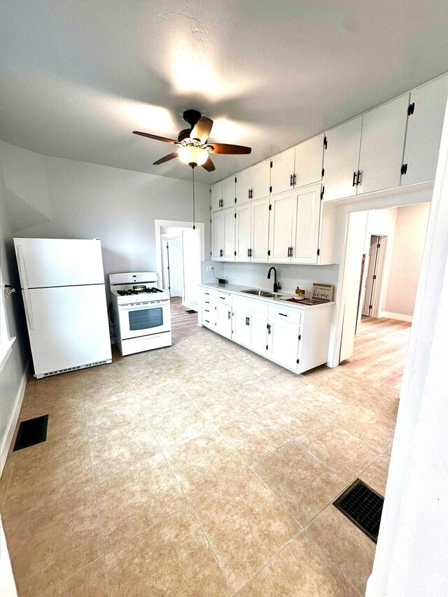 1022 W 400 N, Salt Lake City, UT 84116 - kitchen featuring a sink, white cabinetry, visible vents, and white appliances
