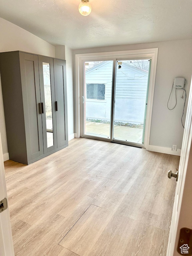 1022 W 400 N, Salt Lake City, UT 84116 - spare room with baseboards and light wood-style floors