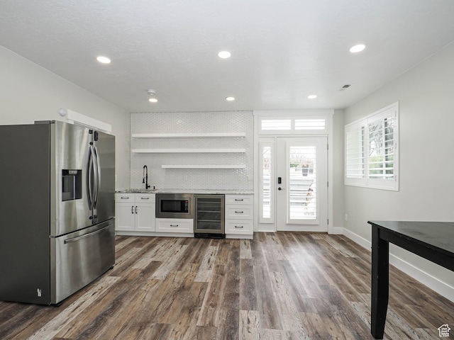 1146 W Jordan River Dr, South Jordan, UT 84095 - kitchen featuring white cabinetry, wine cooler, dark wood-style flooring, and stainless steel appliances
