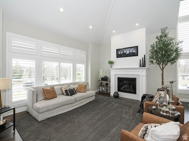 1146 W Jordan River Dr, South Jordan, UT 84095 - living area with recessed lighting, baseboards, high vaulted ceiling, and a glass covered fireplace