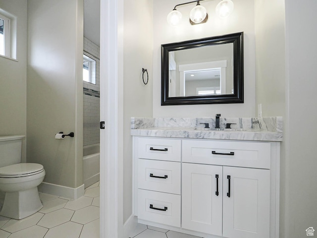 1146 W Jordan River Dr, South Jordan, UT 84095 - full bathroom featuring baseboards, toilet, a bath, tile patterned floors, and vanity