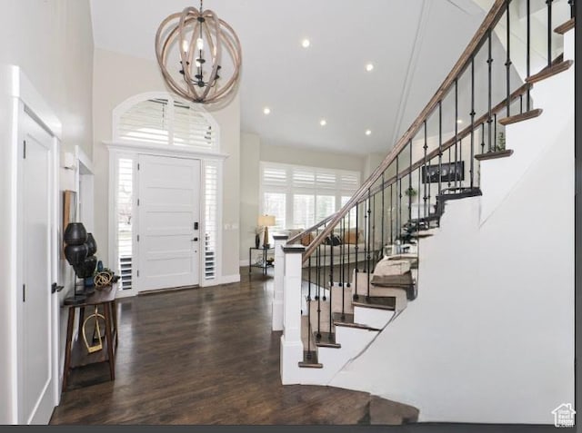 1146 W Jordan River Dr, South Jordan, UT 84095 - foyer featuring wood finished floors, recessed lighting, stairs, a towering ceiling, and a chandelier