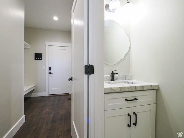 1146 W Jordan River Dr, South Jordan, UT 84095 - bathroom featuring recessed lighting, baseboards, wood finished floors, and vanity