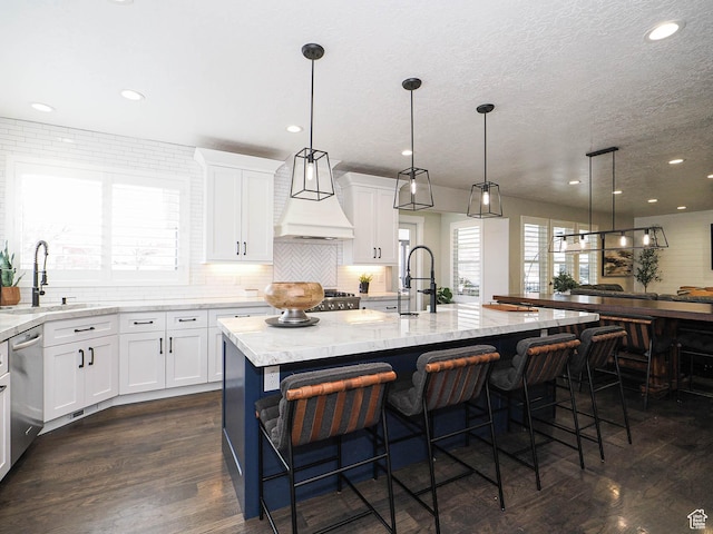 1146 W Jordan River Dr, South Jordan, UT 84095 - kitchen with dark wood-style floors, dishwasher, white cabinetry, and a sink