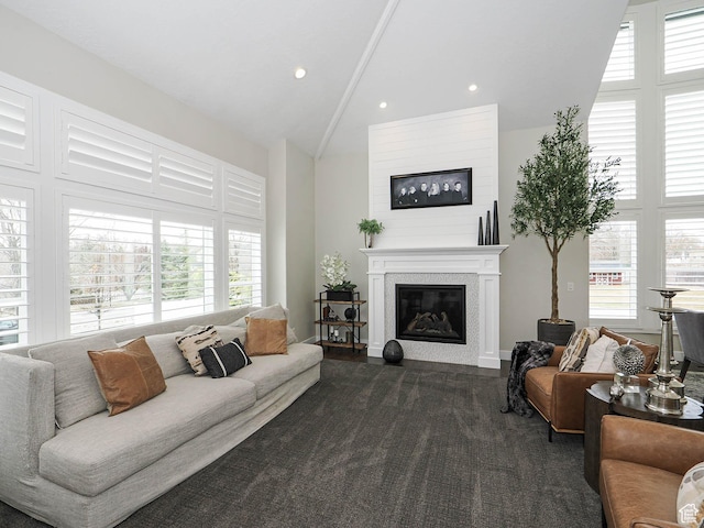 1146 W Jordan River Dr, South Jordan, UT 84095 - living room with recessed lighting, a glass covered fireplace, a healthy amount of sunlight, and high vaulted ceiling