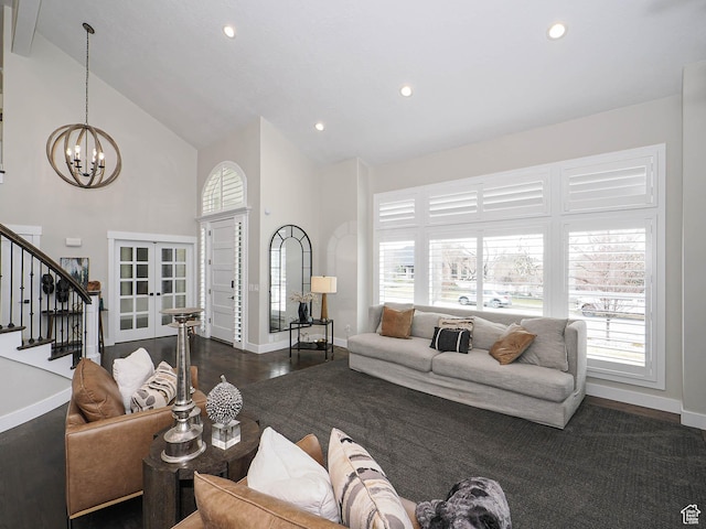 1146 W Jordan River Dr, South Jordan, UT 84095 - living area featuring stairway, a healthy amount of sunlight, high vaulted ceiling, and wood finished floors