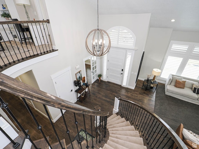 1146 W Jordan River Dr, South Jordan, UT 84095 - foyer with a chandelier, stairway, and a wealth of natural light