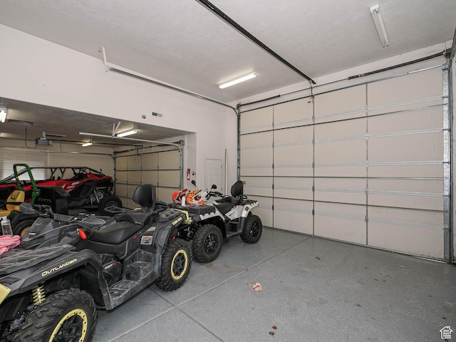 1146 W Jordan River Dr, South Jordan, UT 84095 - garage featuring a garage door opener