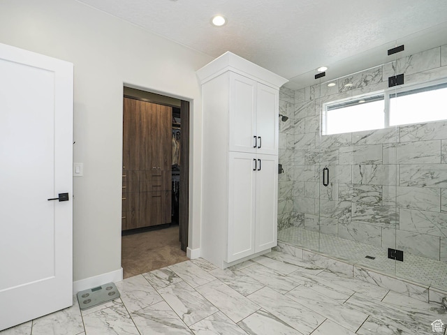 1146 W Jordan River Dr, South Jordan, UT 84095 - bathroom with a shower stall, a walk in closet, baseboards, recessed lighting, and marble finish floor