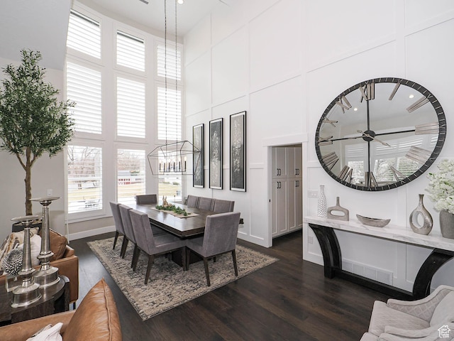 1146 W Jordan River Dr, South Jordan, UT 84095 - dining room featuring baseboards, a high ceiling, and dark wood-style floors