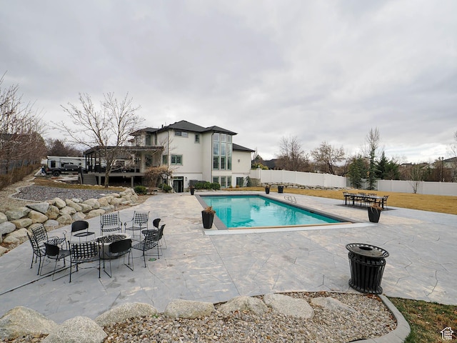 1146 W Jordan River Dr, South Jordan, UT 84095 - view of swimming pool with a fenced in pool, a patio, and fence