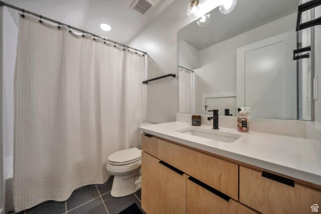 869 S Washington St Unit 101, Salt Lake City, UT 84101 - full bath with vanity, tile patterned floors, toilet, and visible vents