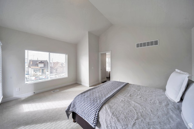 869 S Washington St Unit 101, Salt Lake City, UT 84101 - carpeted bedroom featuring visible vents, high vaulted ceiling, and baseboards