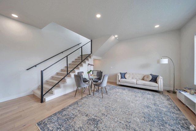 869 S Washington St Unit 101, Salt Lake City, UT 84101 - living area with stairway, recessed lighting, wood finished floors, and baseboards