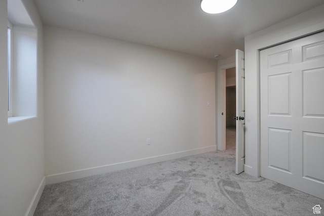 865 W 1800 N, Mapleton, UT 84664 - unfurnished bedroom featuring baseboards, light carpet, and a closet