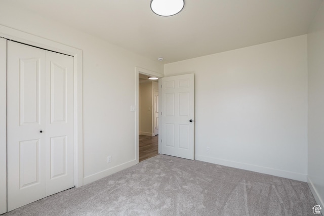 865 W 1800 N, Mapleton, UT 84664 - unfurnished bedroom featuring a closet, carpet flooring, and baseboards