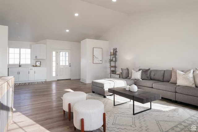 865 W 1800 N, Mapleton, UT 84664 - living room featuring light wood finished floors, recessed lighting, high vaulted ceiling, and baseboards
