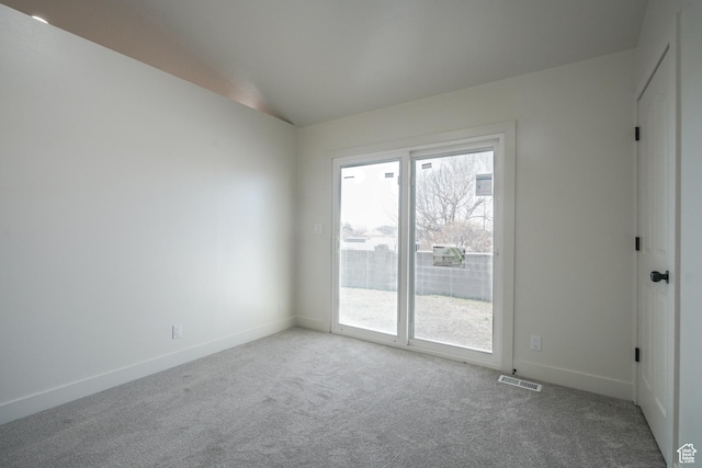 865 W 1800 N, Mapleton, UT 84664 - unfurnished room with vaulted ceiling, a healthy amount of sunlight, baseboards, and carpet floors