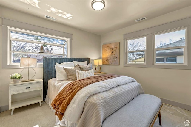 1444 E Sherman Ave, Salt Lake City, UT 84105 - bedroom featuring baseboards, visible vents, and light carpet