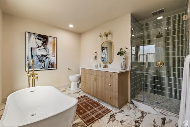 1444 E Sherman Ave, Salt Lake City, UT 84105 - bathroom with visible vents, marble finish floor, tiled shower, vanity, and a freestanding bath