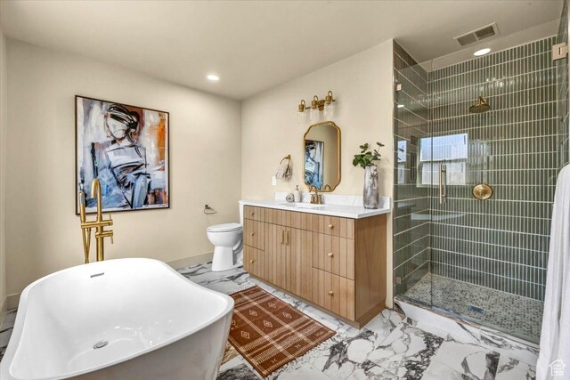 1444 E Sherman Ave, Salt Lake City, UT 84105 - full bathroom featuring vanity, a freestanding tub, a shower stall, marble finish floor, and visible vents