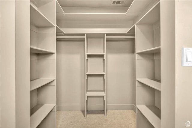 1444 E Sherman Ave, Salt Lake City, UT 84105 - walk in closet with carpet flooring and visible vents