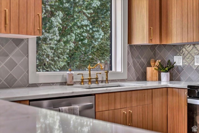 1444 E Sherman Ave, Salt Lake City, UT 84105 - kitchen featuring dishwasher, modern cabinets, a sink, backsplash, and electric range