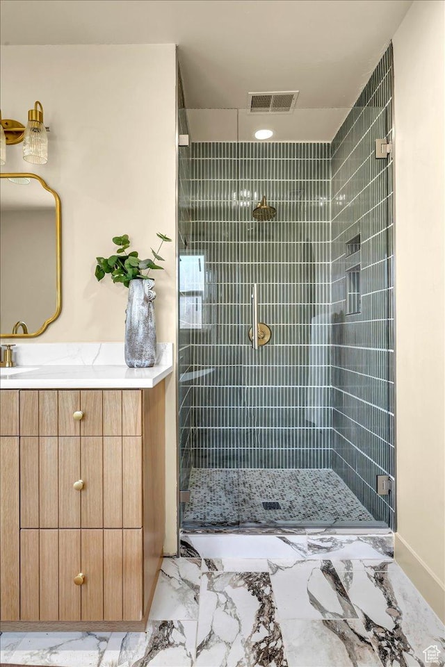 1444 E Sherman Ave, Salt Lake City, UT 84105 - full bathroom featuring marble finish floor, visible vents, a tile shower, and vanity