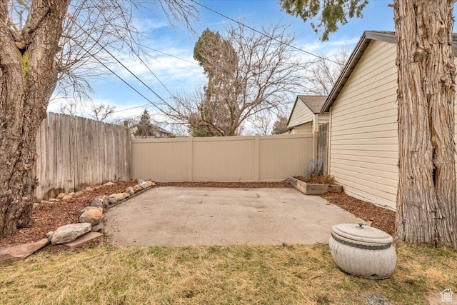 1662 E Browning Ave, Salt Lake City, UT 84105 - view of yard featuring a patio area and a fenced backyard