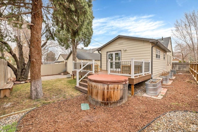 1662 E Browning Ave, Salt Lake City, UT 84105 - rear view of house featuring a wooden deck and a fenced backyard