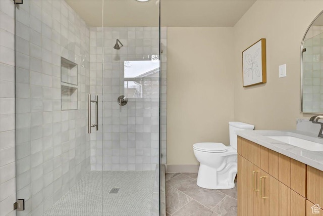 1662 E Browning Ave, Salt Lake City, UT 84105 - bathroom featuring baseboards, toilet, a stall shower, and vanity