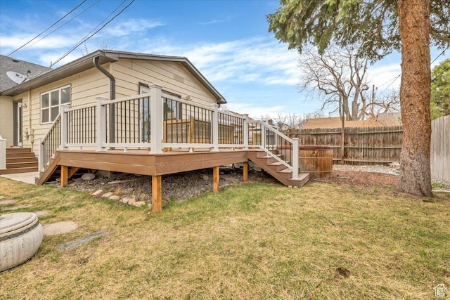1662 E Browning Ave, Salt Lake City, UT 84105 - rear view of property featuring a lawn, stairs, a deck, and fence