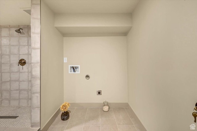 1662 E Browning Ave, Salt Lake City, UT 84105 - clothes washing area with electric dryer hookup, tile patterned floors, baseboards, hookup for a washing machine, and laundry area