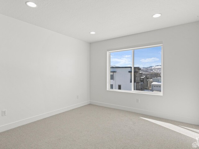 1151 Gambel Oak Way Unit 54, Park City, UT 84098 - carpeted spare room featuring recessed lighting, baseboards, and a textured ceiling