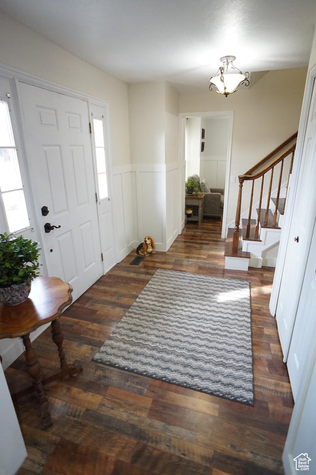 6835 S Larabrook Way, West Jordan, UT 84084 - entryway featuring stairs, a chandelier, wainscoting, and wood finished floors