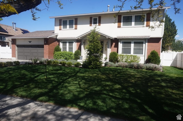 6835 S Larabrook Way, West Jordan, UT 84084 - traditional-style house featuring a front yard, a garage, brick siding, fence, and stucco siding