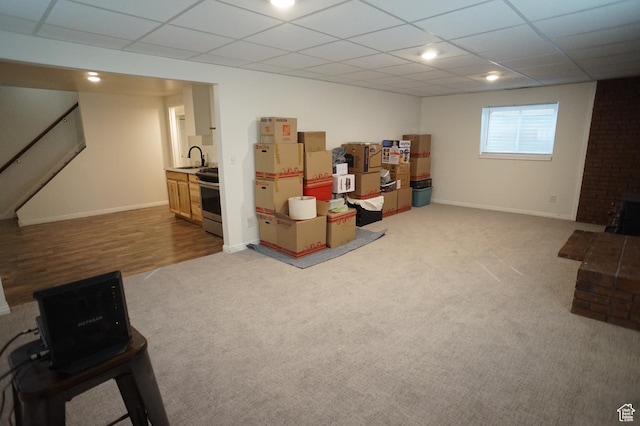 6835 S Larabrook Way, West Jordan, UT 84084 - basement with baseboards, carpet flooring, a sink, and a drop ceiling